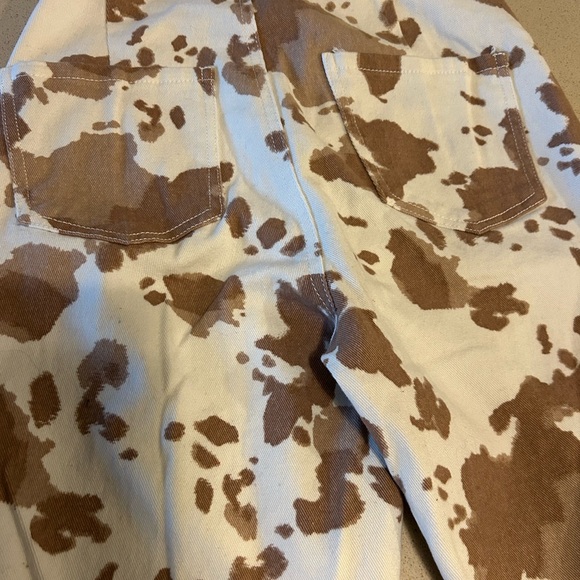 Altar'd State Brown and Cream Cow Patterned Flare Bell Bottom Pants - Picture 5 of 8